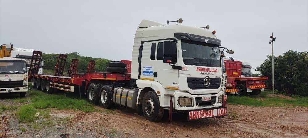 MISGANA CAT excavator on lowbed trailer cross-border SADC transport